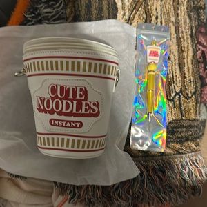 Brand new cute noodle’s crossbody with strap.